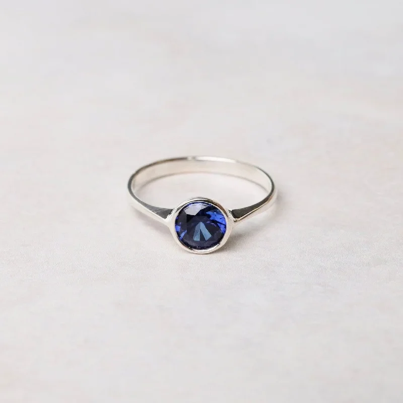 Sterling Silver Ring with 6mm Round Bezel Set Synthetic Sapphire