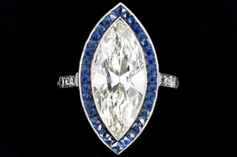 Art Deco Inspired Platinum 5.11 Carat Marquise Cut Diamond & Sapphire Ring GIA Certified