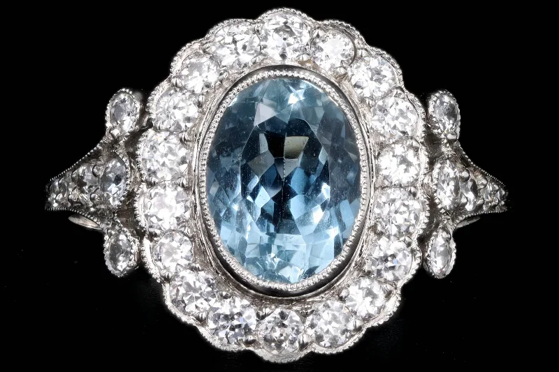 Art Deco Inspired Platinum 1.50 Carat Aquamarine & Diamond Halo Ring