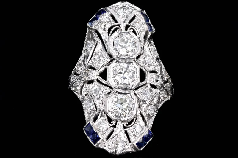 Art Deco Platinum Old European Cut Diamond Three Stone and French Cut Sapphire Hand Engraved Shield Ring