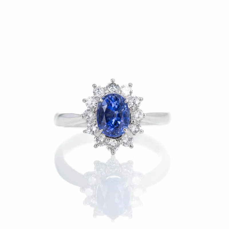 Platinum 1.56 Carat Oval Sapphire Diamond Halo Ring