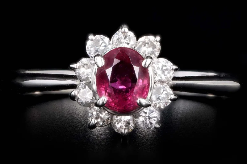 Platinum .31 Carat Natural Ruby & Diamond Halo Ring